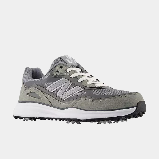 New Balance Golf 1982 Golf shoes in gray and white with a mesh upper, suede overlays, and spiked outsole, side view.