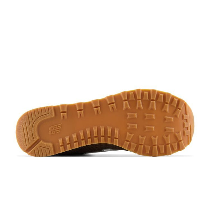 New Balance 515 v3 shoes outsole featuring durable gum rubber with rugged traction pattern, sole/bottom view.