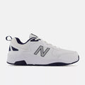 New Balance 857v3 training shoes in white with navy accents, synthetic upper and durable outsole, side view.