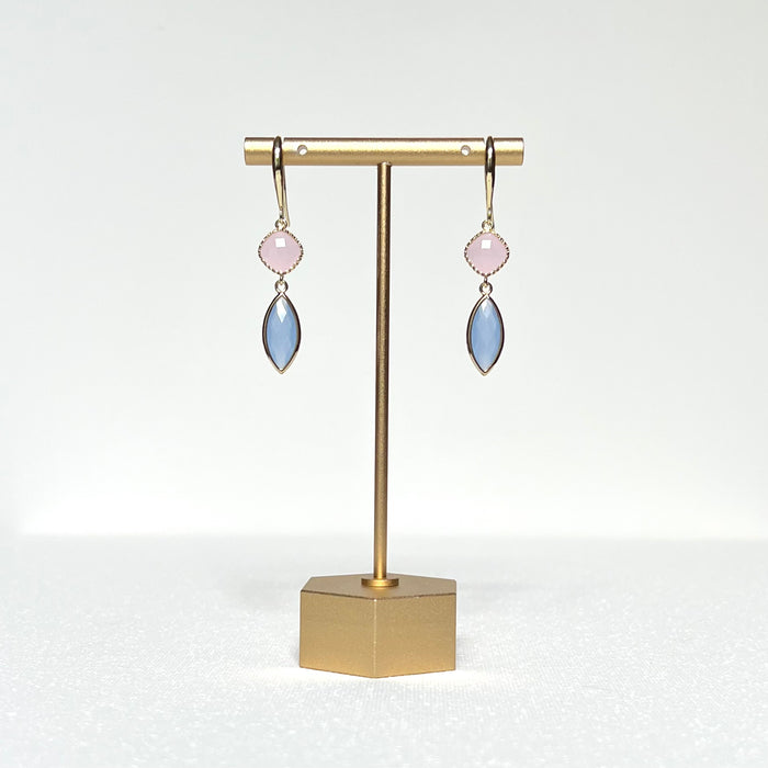 This earring set features a pale pink glass fancy bezel prong set charm and a pale blue glass marquis shaped bezel charm hung by a simple gold filled French hook.