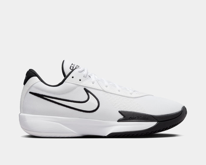 Nike Air Zoom G.T. Cut Academy basketball shoes in white with black accents, mesh upper, and Zoom Air cushioning, side view.