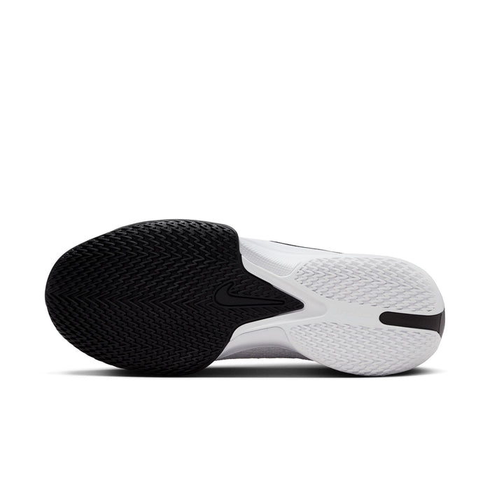 Nike Air Zoom G.T. Cut Academy basketball shoes outsole view featuring black and white rubber with multidirectional traction pattern.