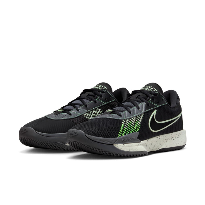 Nike Air Zoom G.T. Cut Academy basketball shoes in black with neon green accents, mesh upper, speckled foam midsole, front angle view.