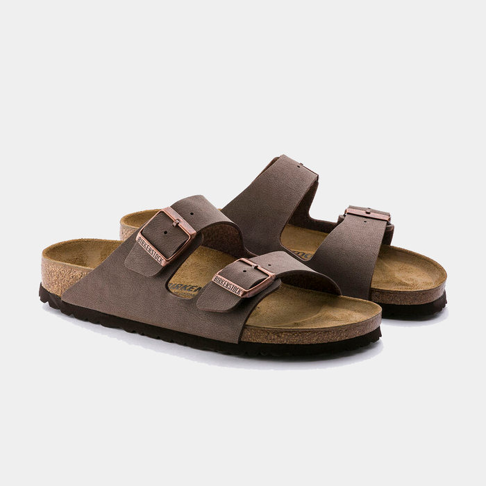 Birkenstock Arizona Birko-Flor® Nubuck sandals in mocha brown with adjustable double straps and copper-tone buckles, side angle view.