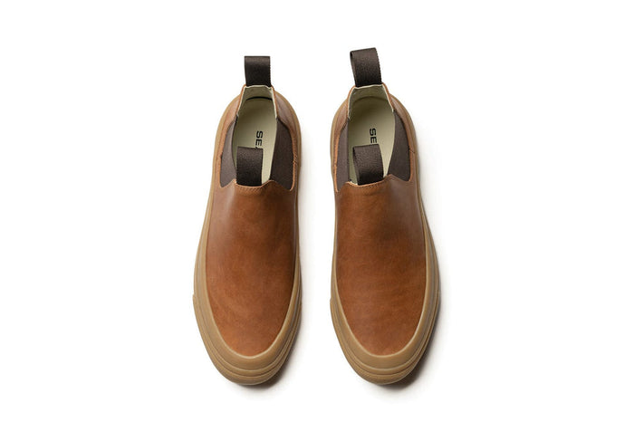 SeaVees Ballard Boot casual slip-on boots in brown leather with elastic side panels and pull tabs, top view.