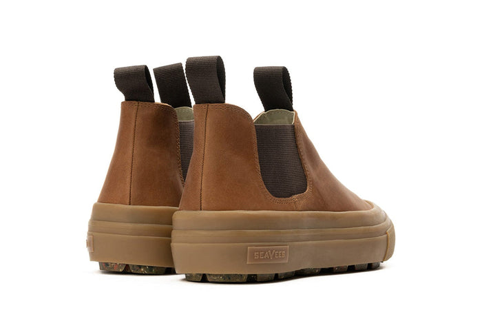 SeaVees Ballard Boot in brown leather with elastic side panels and pull tabs on a gum sole, back view.