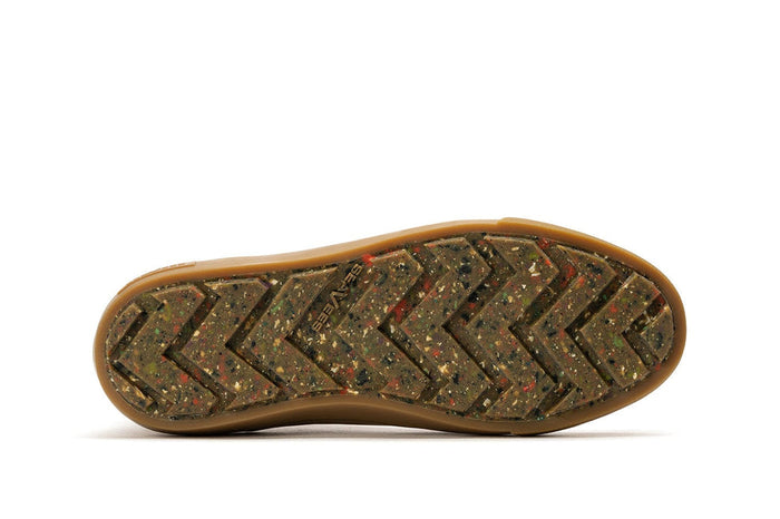 SeaVees Ballard Boot sole with recycled rubber outsole featuring multi-colored speckles and herringbone tread pattern, bottom view.