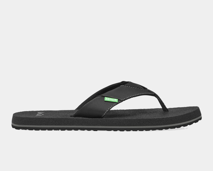 Sanuk Beer Cozy IV sandals in black with cushioned footbed and synthetic strap, side view showing sole and sleek design.