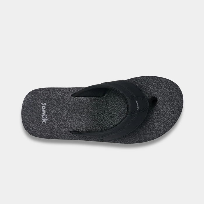 Sanuk Beer Cozy IV flip-flops in black with textured footbed and synthetic strap, top view.