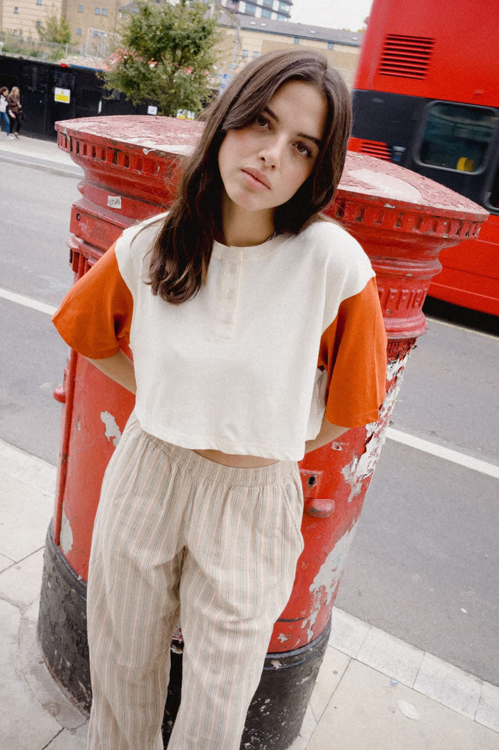 Women's Carefree Organic Garment Dye Cropped Henley in the color Off White/Rust - Women's Lifestyle 1