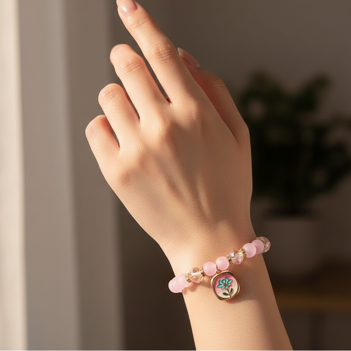 Elegant Pink Lotus Charm Beaded Bracelet