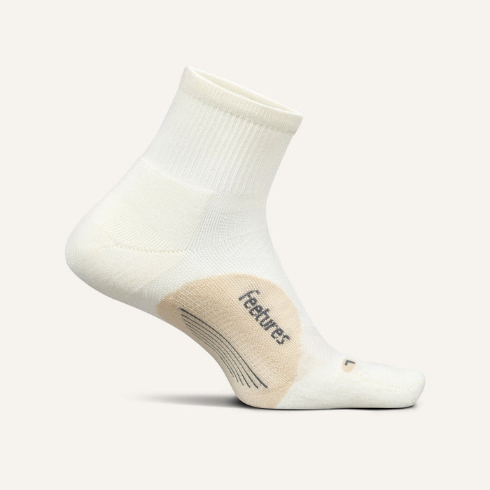 Feetures Elite Light Cushion Quarter socks in white with targeted compression and seamless toe, side view.