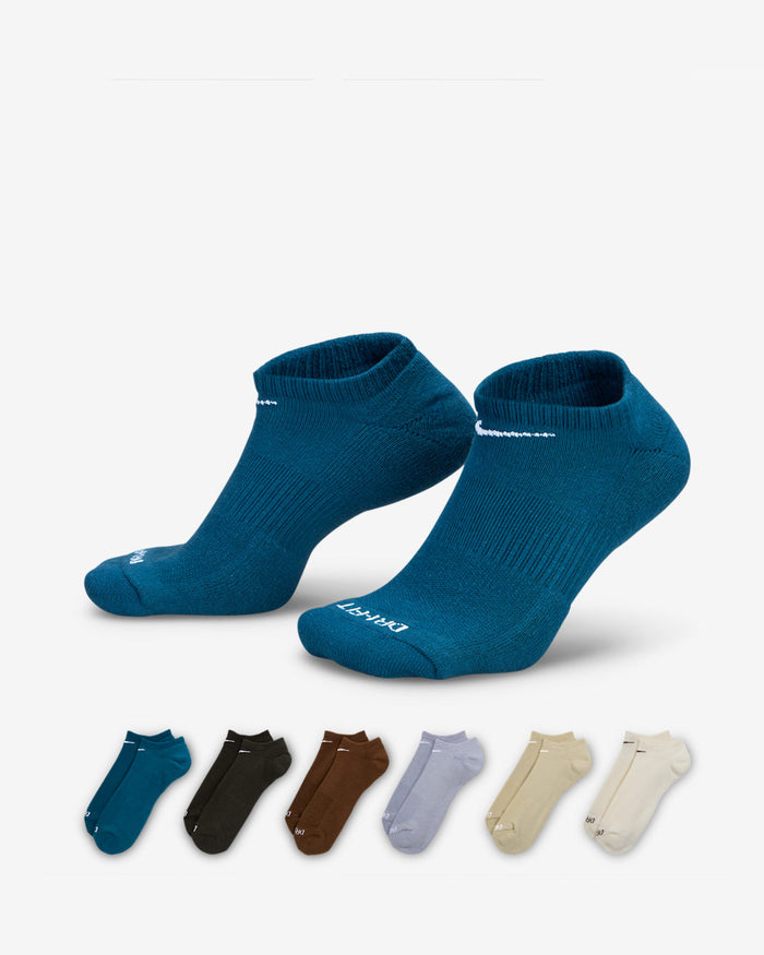 Nike Everyday Plus Cushioned No Show Socks in teal with ribbed cuffs and cushioned sole, front angled view with variety pack colors displayed.