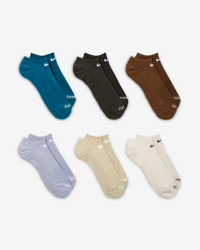 Nike Everyday Plus Cushioned No Show Socks in assorted colors including blue, black, brown, lavender, beige, and white, featuring ribbed cuffs and reinforced toe, front view.