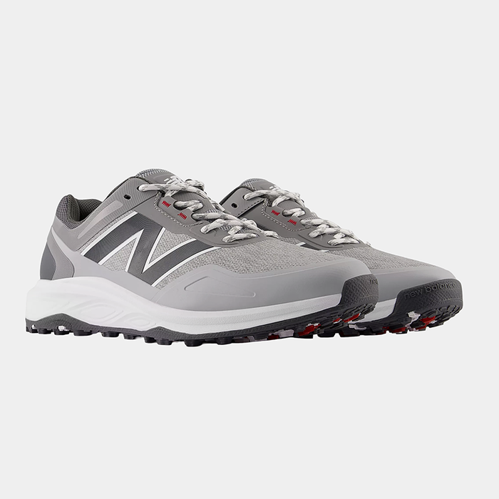 New Balance Golf Fresh Foam Contend v3 golf shoes in gray with mesh upper, white midsole, and spikeless outsole, angled view.