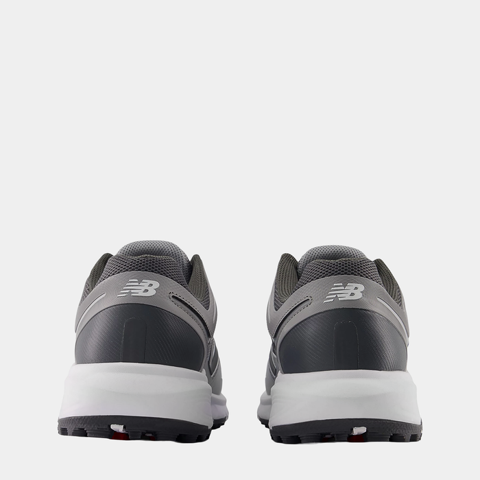 New Balance Golf Fresh Foam Contend v3 golf shoes in gray with mesh upper and white midsoles, back view showing heel details.