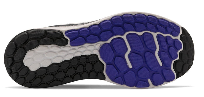 New Balance Fresh Foam Vongo v5 running shoes outsole showing multi-textured rubber tread in black, white, and purple.