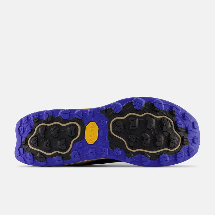New Balance Fresh Foam X Hierro v7 Gore-Tex trail running shoes outsole, showing Vibram grip in purple, black, and yellow rubber.