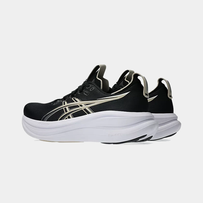 Asics Gel-Nimbus 28 running shoes in black with white midsole and gold accents, side and back view.