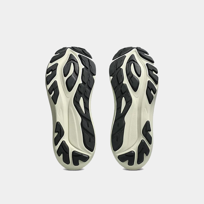 Asics GT-2000 14 TR running shoes outsole with black rubber tread and beige cushioning, bottom view.