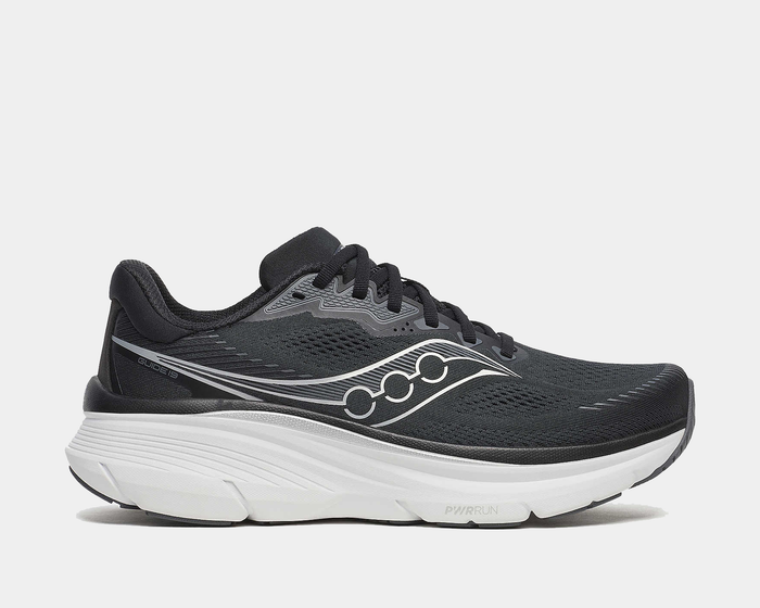 Saucony Guide 19 running shoes in black with white detailing, mesh upper, and PWRRUN cushioning, side view.