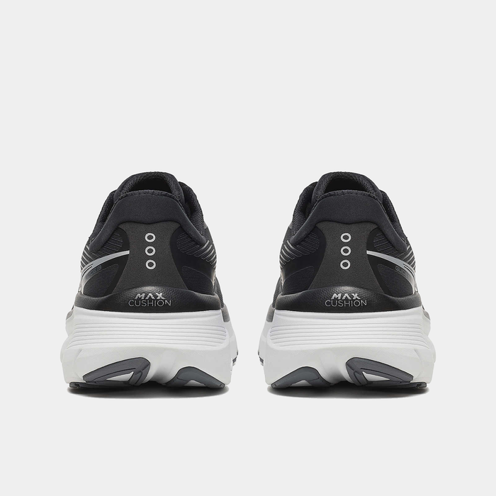 Saucony Guide 19 running shoes in black with white midsoles and MAX Cushion branding, back view showing heel design and outsole details.