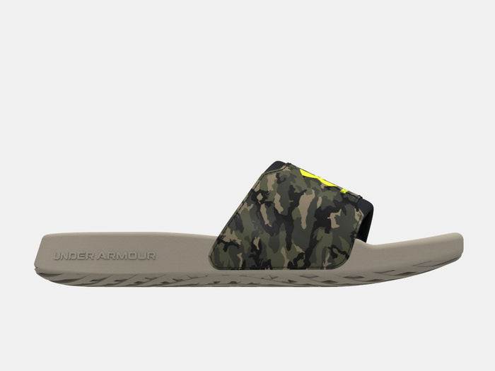 Under Armour Ignite Select Camo slide sandals, camo-pattern strap with bold yellow logo and tan cushioned sole, side view.
