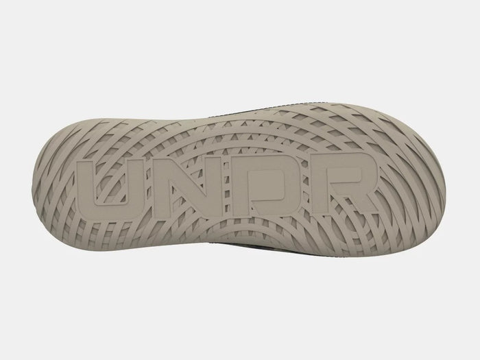 Under Armour Ignite Select Camo sandal outsole in tan with UNDR branding and textured tread pattern, sole/bottom view.