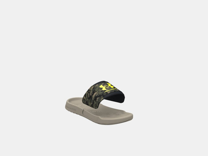 Under Armour Ignite Select Camo slides with camouflage strap and yellow logo, cushioned beige footbed angled side view.