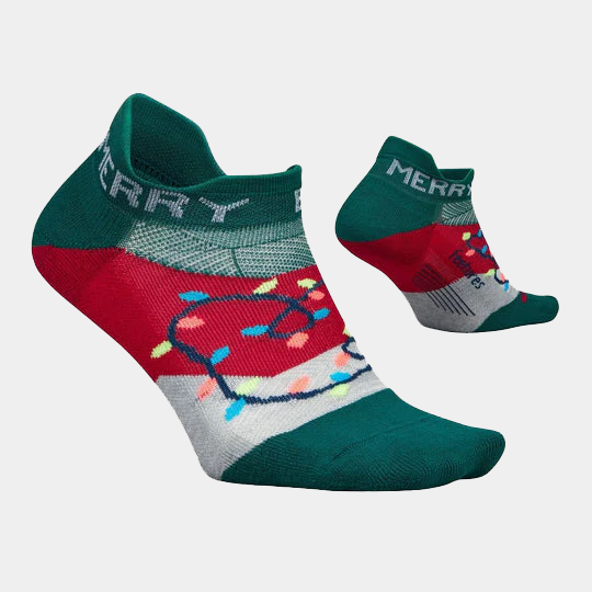 Feetures Limited Edition "Merry & Bright" Elite Light Cushion No Show Tab Socks, festive multicolor design with holiday lights, side view.