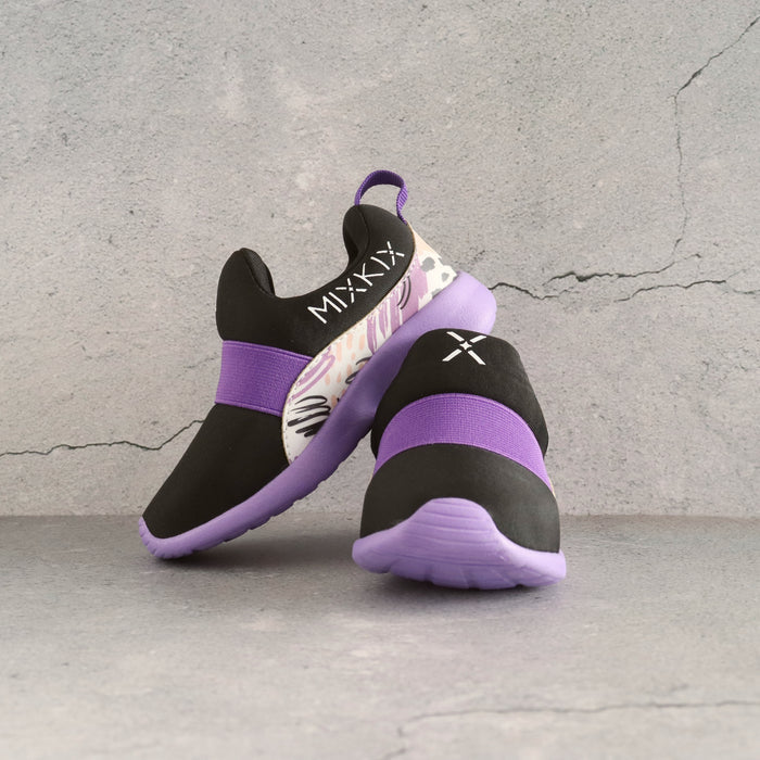 Black and purple 90s style kids slip-on sneakers with bold patterns and supportive cushioning.