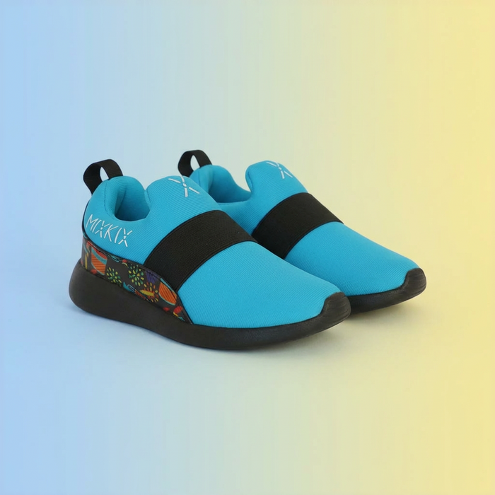 Pair of blue and black shoes on a gradient background