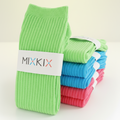 Stack of colorful cotton socks with a 'MIXKIX' label on a light background for growing feet