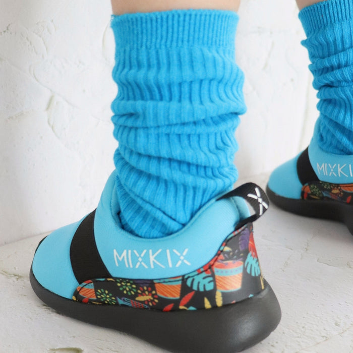 Blue slip-on sneaker and cotton sock set for kids and toddlers.
