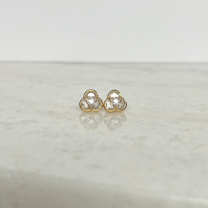 Three in one shaped triangular gold and cubic zirconia stud earrings, representing the Most Holy Trinity.