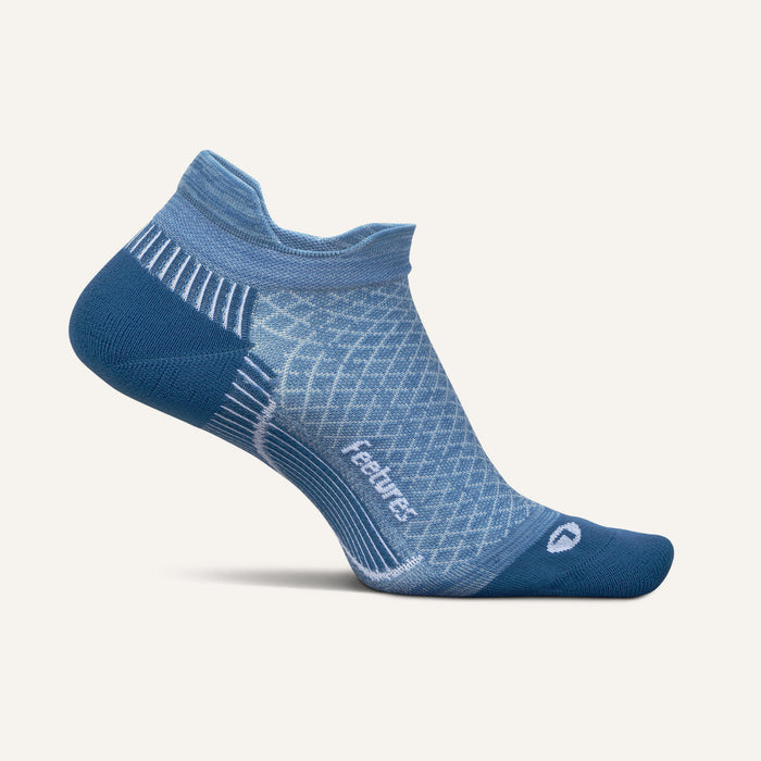 Feetures Plantar Fasciitis Relief Sock Light Cushion No Show Tab in blue with targeted compression zones and breathable fabric, side view.