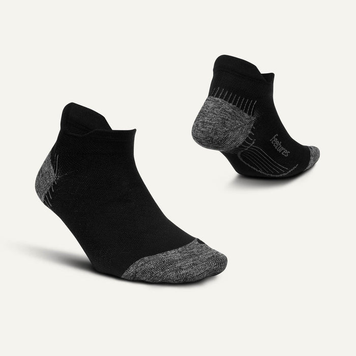 Feetures Plantar Fasciitis Relief Sock Light Cushion No Show Tab socks in black with gray accents, engineered arch support, front and back view.