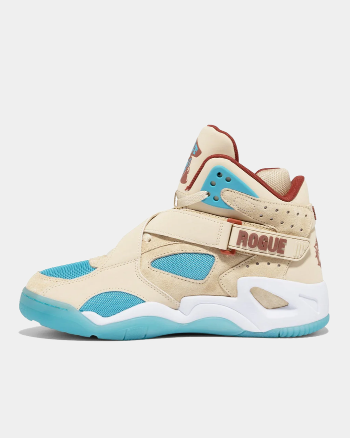 Ewing Athletics ROGUE x ICE T sneakers in beige with blue mesh panels, suede overlays, Velcro strap, and white and blue sole, side view.