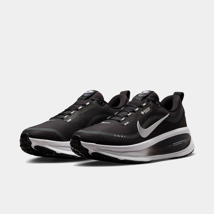 Nike Vomero 18 GORE-TEX running shoes in black with water-resistant GORE-TEX upper and ZoomX cushioning, front angled view.