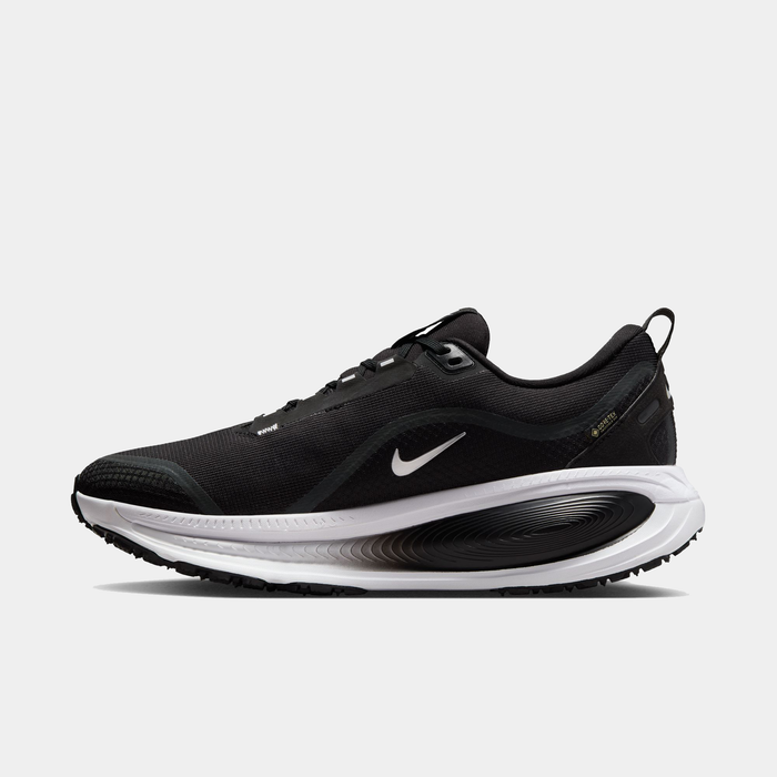 Nike Vomero 18 GORE-TEX running shoes in black with waterproof GORE-TEX upper and cushioned midsole, side view.