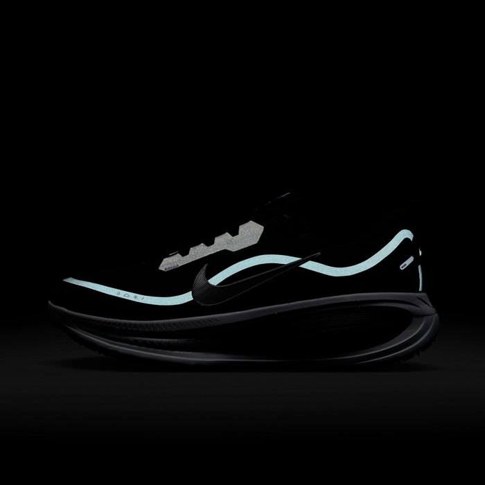Nike Vomero 18 GORE-TEX running shoes in black with reflective accents and waterproof GORE-TEX material, side view.